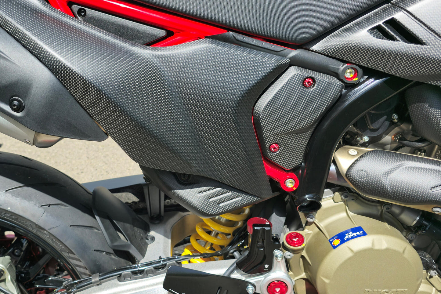 ZA276Y - CNC Racing Carbon Fiber Rear Exhaust Guard for the Ducati Hypermotard 698 Mono
