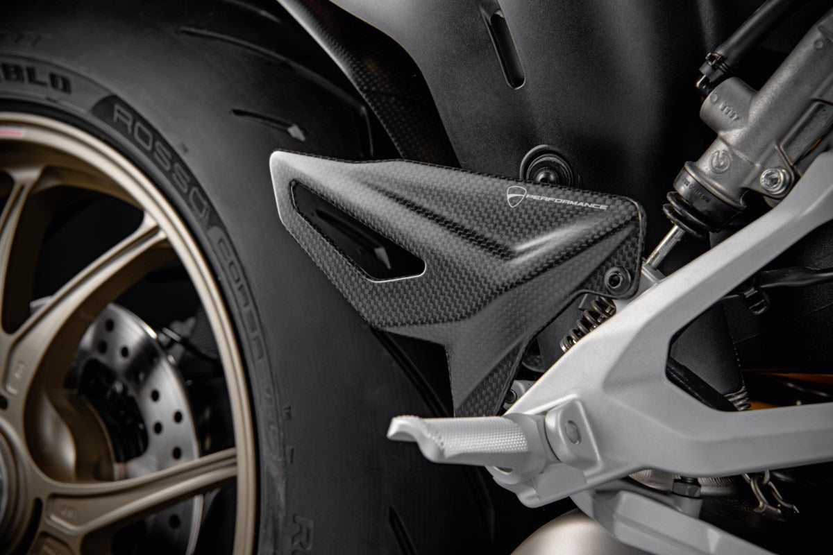 96981062A - CARBON FIBER HEEL GUARDS