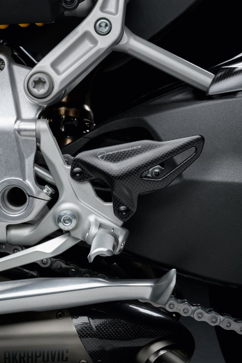 96981062A - CARBON FIBER HEEL GUARDS