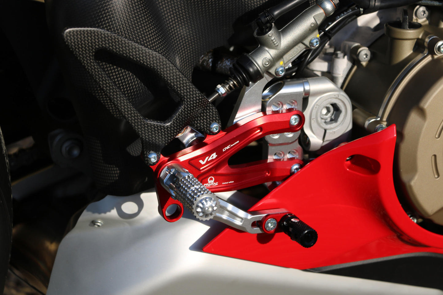 PE408PR - CNC Racing PRAMAC RACING LIMITED EDITION RPS Adjustable Rearset for the Ducati Panigale V4 / S / R - with Carbon Heel guard