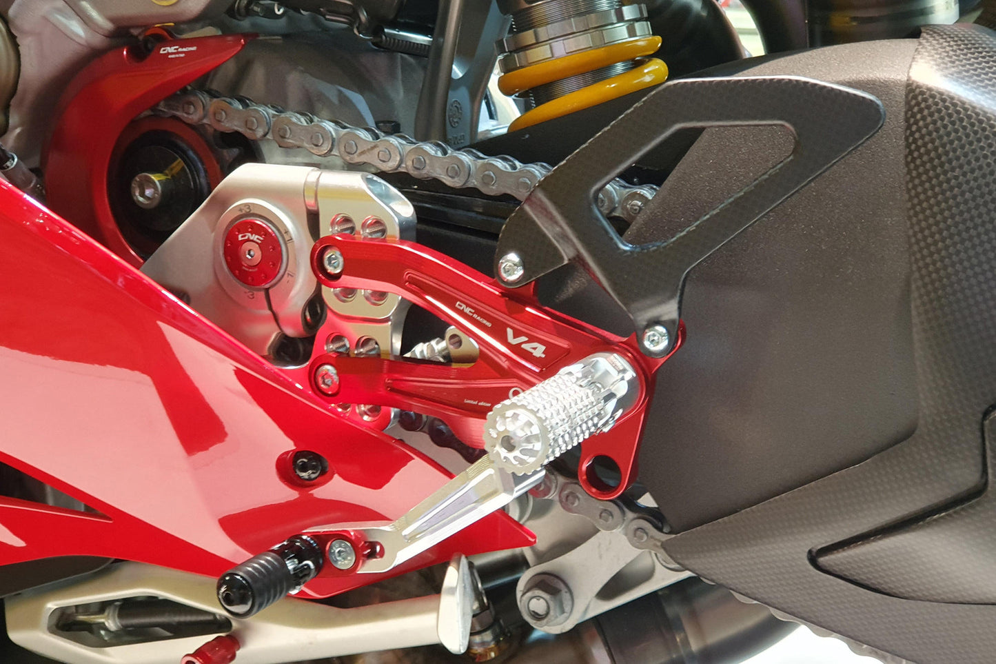 PE408PR - CNC Racing PRAMAC RACING LIMITED EDITION RPS Adjustable Rearset for the Ducati Panigale V4 / S / R - with Carbon Heel guard
