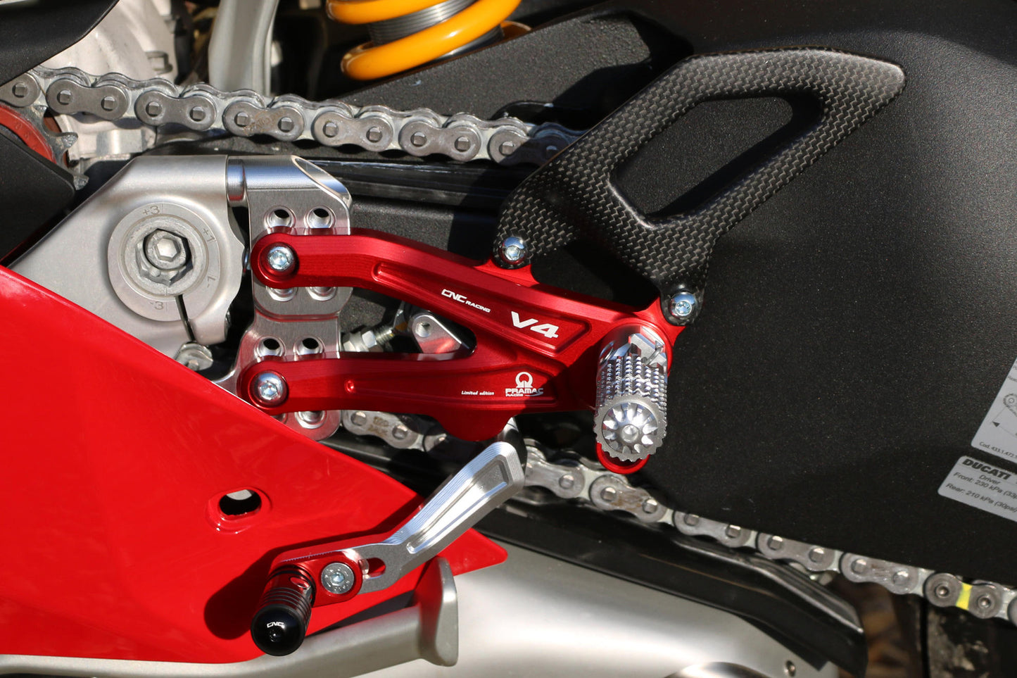PE408PR - CNC Racing PRAMAC RACING LIMITED EDITION RPS Adjustable Rearset for the Ducati Panigale V4 / S / R - with Carbon Heel guard