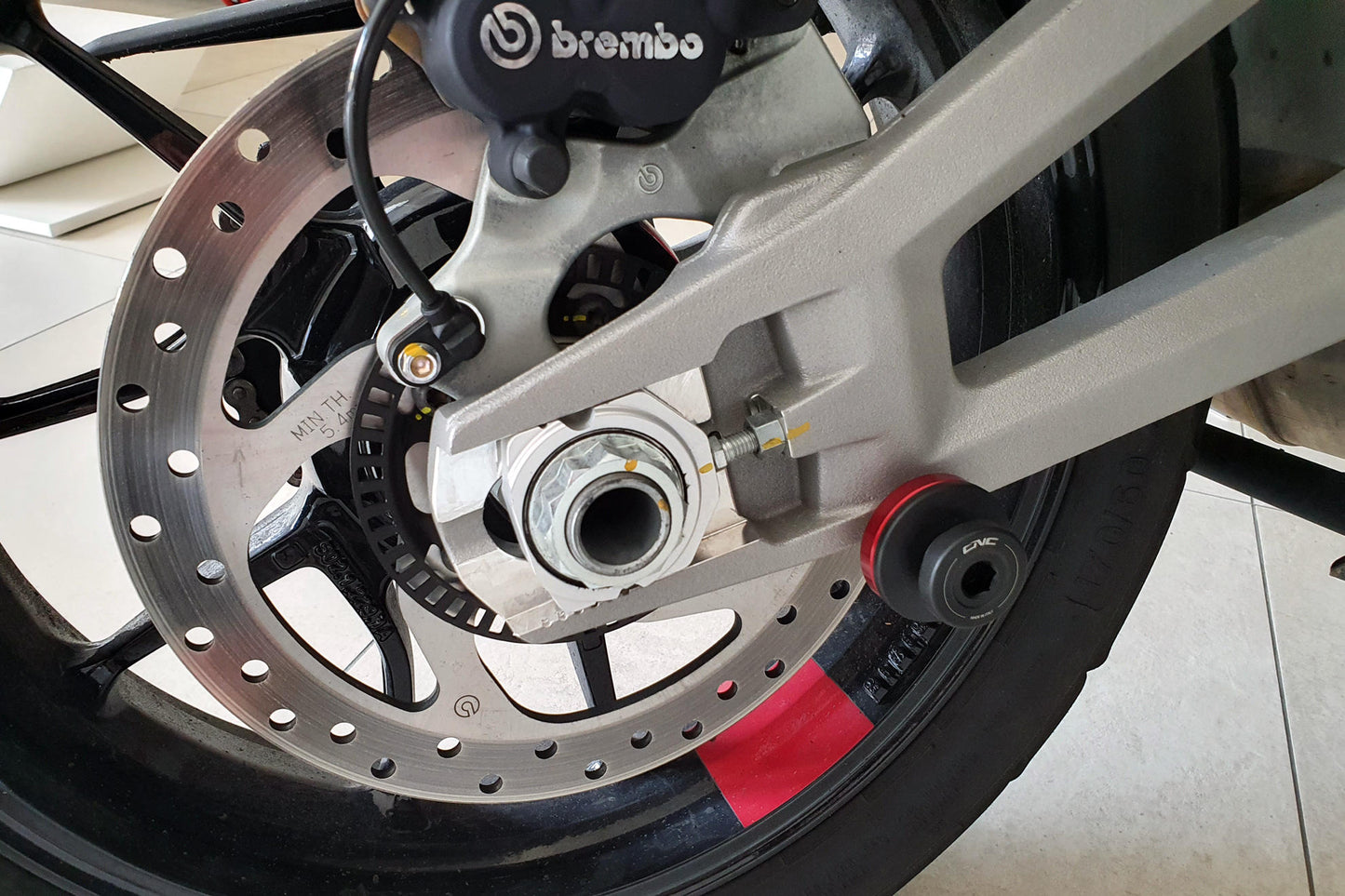 SC300 - CNC Racing Large Delrin / Aluminum Swing Arm Spools for Ducati Mulitstrada V4 / 950 / 1200 / 1260 Enduro (M8 size)